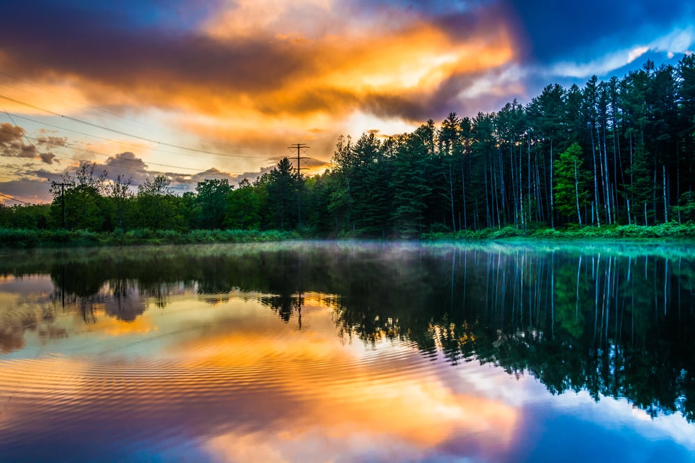 Sunset sky reflecting in a pond at Delaware Water Gap National Recreational Area, New Jersey.